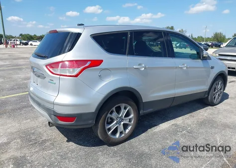 2013 Ford Escape Sel z USA, uszkodzony, nr VIN 1FMCU0H98DUC79356